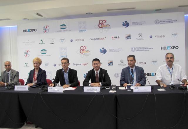 From left to right, the Scientific Director of the ‘Orama Elpidos’ Association, Mr Stelios Grafakos, the Deputy Minister for the Interior (Macedonia-Thrace), Ms Maria Kollia-Tsaroucha , the President of TIF – HELEXPO, Mr Tasos Tzikas, the political counsellor of the Chinese Embassy in Greece, Mr. Gao Wenqi, the CEO of TIF- HELEXPO, Mr Kyriakos Pozrikidis and  the Deputy General Director of TIF-HELEXPO, Mr Alexis Tsaxirlis.