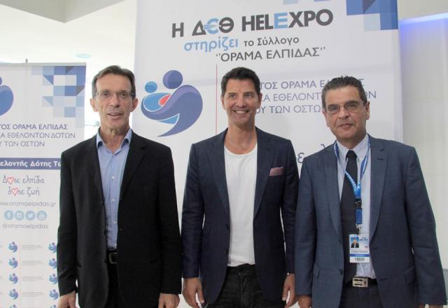 From left to right , the President of TIF – HELEXPO, Mr Tasos Tzikas , the Messenger of the ‘Elpida’ Association of Friends of Children with Cancer and the ‘Orama Elpidas’ Association, Mr Sakis Rouvas the CEO of TIF- HELEXPO, Mr Kyriakos Pozrikidis